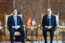 El primer ministro de Vietnam, Pham Minh Chinh (izquierda), y su homólogo de Malasia, Anwar Ibrahim. (Foto: VNA)